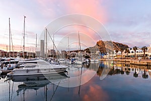 Alicante Port d`Alacant marina with boats and view of castle Castillo evening travel traveling holidays vacation in Spain photo