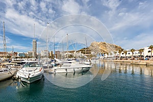 Alicante Port d`Alacant marina with boats and view of castle Castillo travel traveling holidays vacation in Spain