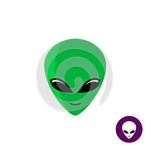 Alien face logo. Planet UFO intruder. photo