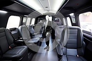 alien official, traveling in sleek and spacious shuttle to meeting with otherworldly officials