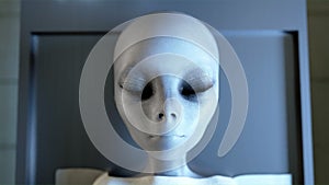 Alien opens eyes in morgue. Autopsy concept. Cinematic 4k footage.