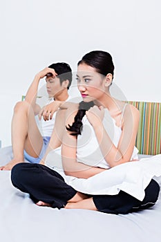 Alienated Chinese couple, woman is rejecting her man