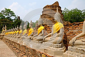 Aligned buddha statues at Wat Yai Chai Mongkhon Ayutthaya Thailand