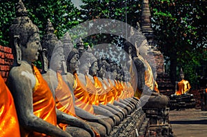 Aligned buddha statues at Wat Yai Chaimongkol Ayutthaya, Bangkok, Thailand