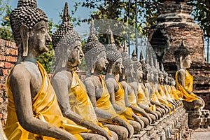aligned buddha statues Wat Yai Chaimongkol Ayutthaya bangkok thailand