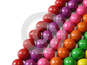 Aligned chewing gum balls by color photo