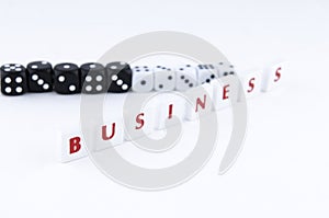 Aligned scrabble pieces forming the word business