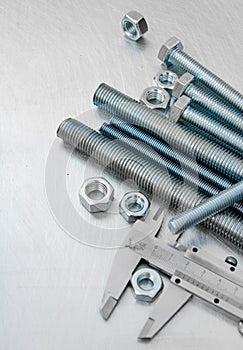 ÃÂ¡aliper and hairpins on the scratched metal