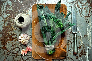 Alkaline diet : kale leaves on a vintage background photo