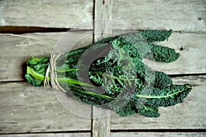 Alkaline, healthy food : kale leaves on a vintage background
