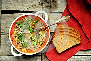 Alkaline, healthy meal: soybeans sprout soup and bread