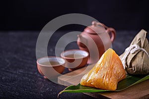 Alkaline rice dumpling zongzi - Traditional sweet Chinese crystal food on a plate to eat for Dragon Boat Duanwu Festival