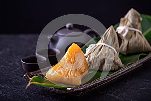 Alkaline rice dumpling zongzi - Traditional sweet Chinese crystal food on a plate to eat for Dragon Boat Duanwu Festival