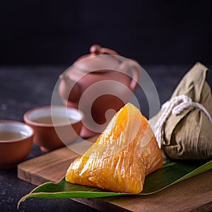 Alkaline rice dumpling zongzi - Traditional sweet Chinese crystal food on a plate to eat for Dragon Boat Duanwu Festival