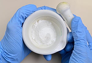 Alkylbenzene sulfonates powder on blue background