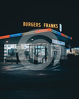 All American Hamburger Drive In neon sign at night, Massapequa, New York