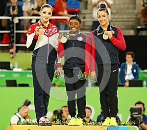 All-around gymnastics medalists at Rio 2016 Olympics Aliya Mustafina of Russia (L),Simone Biles and Aly Raisman of USA