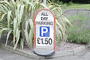 All day parking fee cost sign at car park entrance photo