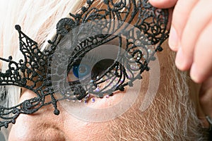 All the freaky people make the beauty of the world. Fetish fashion. Transgender man wear lace mask. BDSM fashion