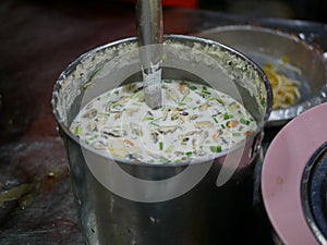 All fresh colorful ingredients mixed in a cup ready to be cooked, oyster omelette  Hoy Tod , on a hot pan at night, Chiang Mai,