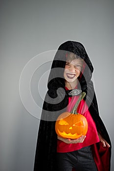 All Hallows Eve. Boy age dressed in a costume for Halloween.