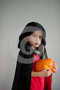 All Hallows Eve. Boy age dressed in a costume for Halloween.