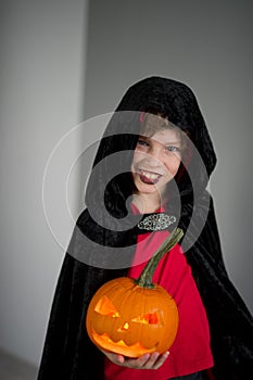 All Hallows Eve. Boy age dressed in a costume for Halloween.