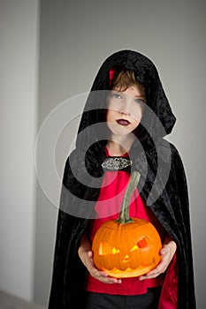 All Hallows Eve. Boy age dressed in a costume for Halloween.