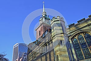 All Hallows by the Tower Church in the financial district of the City of London with 20 Fenchurch Street Walkie Talkie in the ba