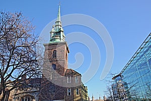 All Hallows by the Tower Church in the financial district of the City of London with the Tower of London in the background