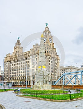 All heroes of the marine engine room memorial in front of the Royal Liver building Liverpool, England