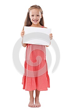 All kids will love this. Full length shot of a young girl holding a blank sign for copyspace.