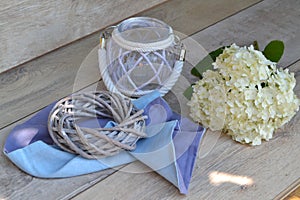 All Saints Day theme. Lantern with hydrangea flower on shabby background