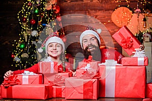 All this is from santa. Happy holidays. Favorite childhood memories of christmas. Father bearded man and daughter near