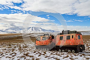 All-terrain articulated tracked carrier in the tundra