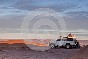 All-terrain car in a desert photo