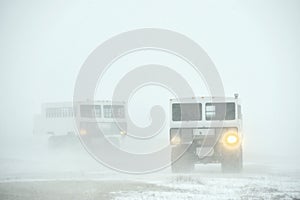 The all-terrain vehicle for snow trips to a snow blizzard in the tundra. Special car for the Arctic safari.