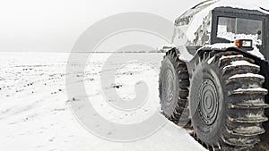 All-terrain vehicles on a winter background. Powerful off-road transporter. Engine, cross. Adventure concept
