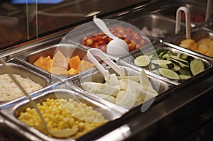 All you can eat buffet food tray salad bar SELECTIVE FOCUS