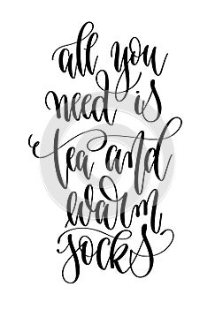All you need is tea and warm socks - hand lettering inscription