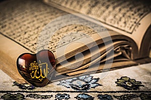 Allah god of Islam symbol koran background