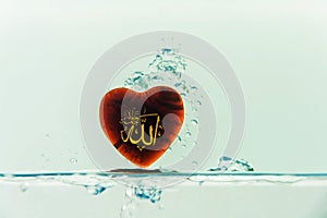 `allah` god of Islam with symbol Water splash with bubbles of air, on the white background