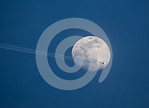 Allegiant Airliner Passing in Front of a Full Moon