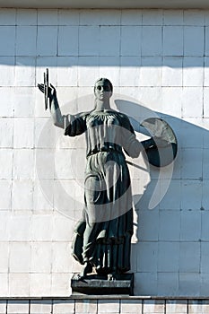 Allegoric woman sculpture on the old building facade of The ArtistÃ¢â¬â¢s House in Kyiv, Ukraine photo