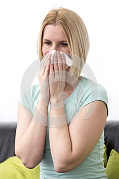 Allergic Female, blow his nose.