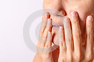 Allergic women have eczema dry nose and lips on winter season closeup.