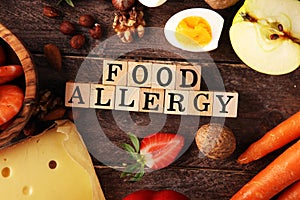 Allergy food concept. Allergy food as almonds, milk, cheese, strawberry, seeds, eggs, peanuts and .crustaceans or shrimps with