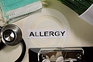 Allergy with inspiration and healthcare/medical concept on desk background