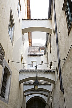 Alley with arcades in Bolzano, Italy