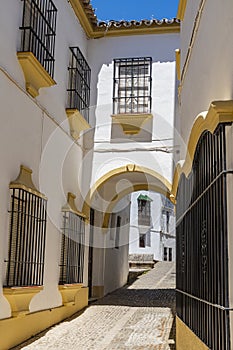 Alley with archway Ronda Spain